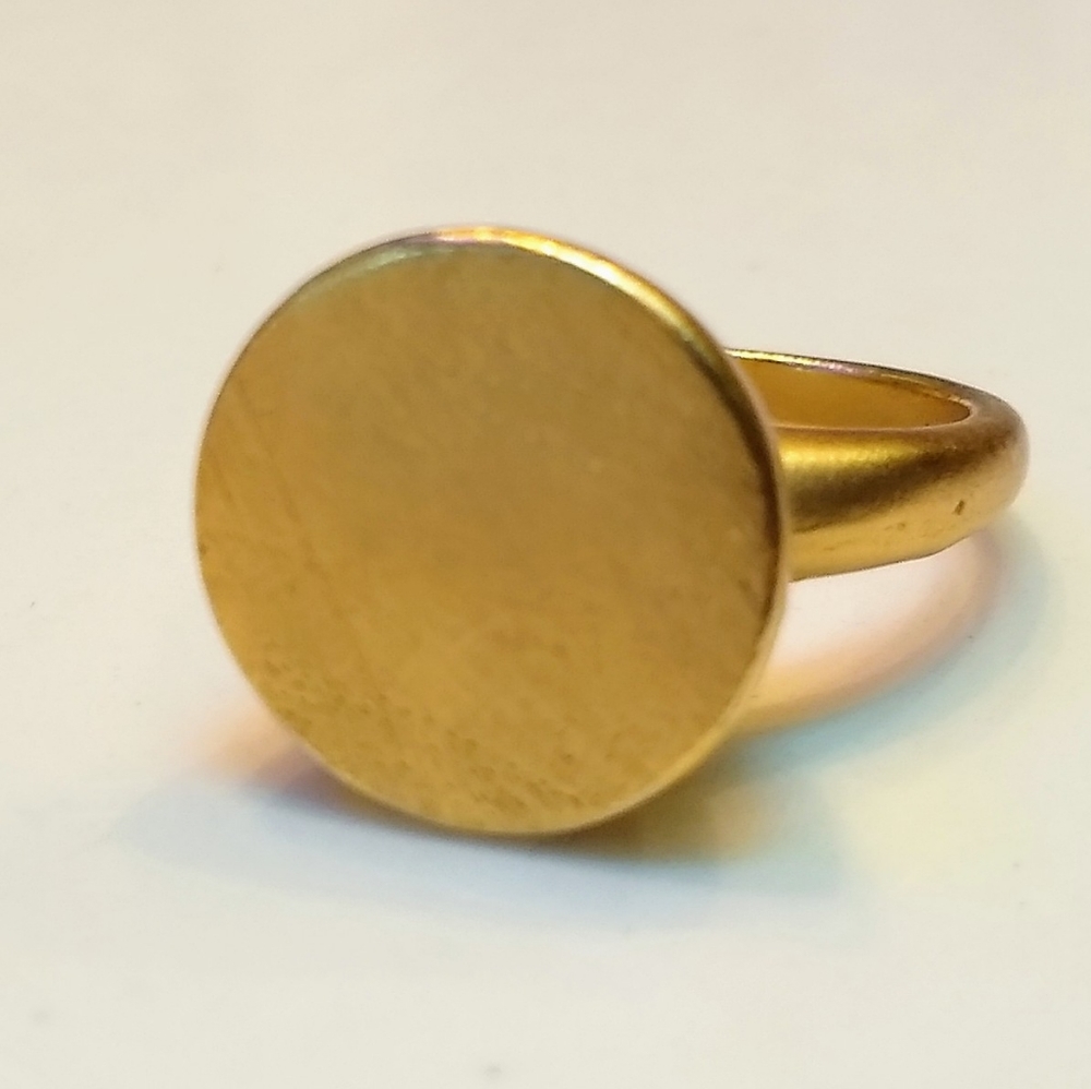 Gold disk statement ring